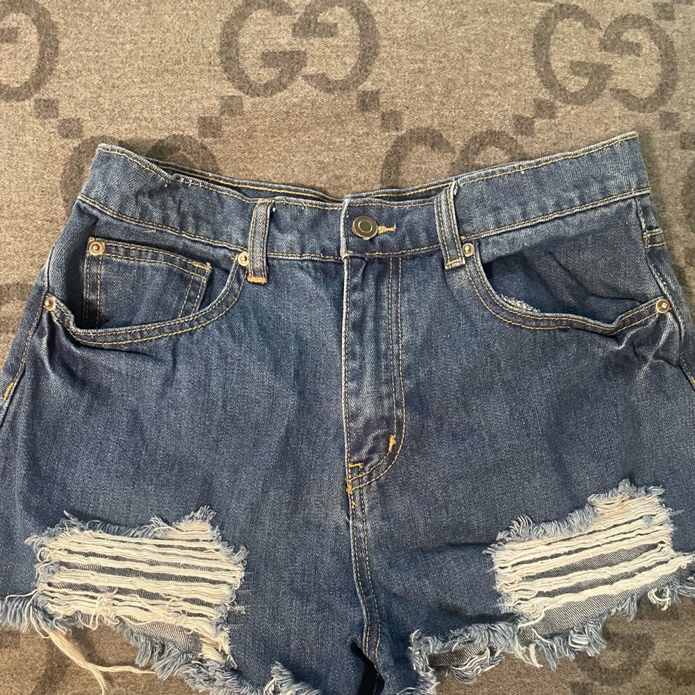 Distressed Denim Shorts.